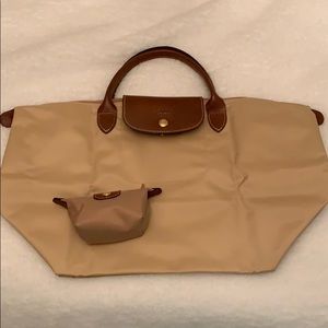 Tan Longchamp short handle bag with coin purse